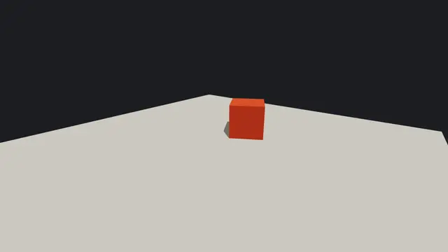 A single red cube on a grey floor: the first frame the studio rendered.